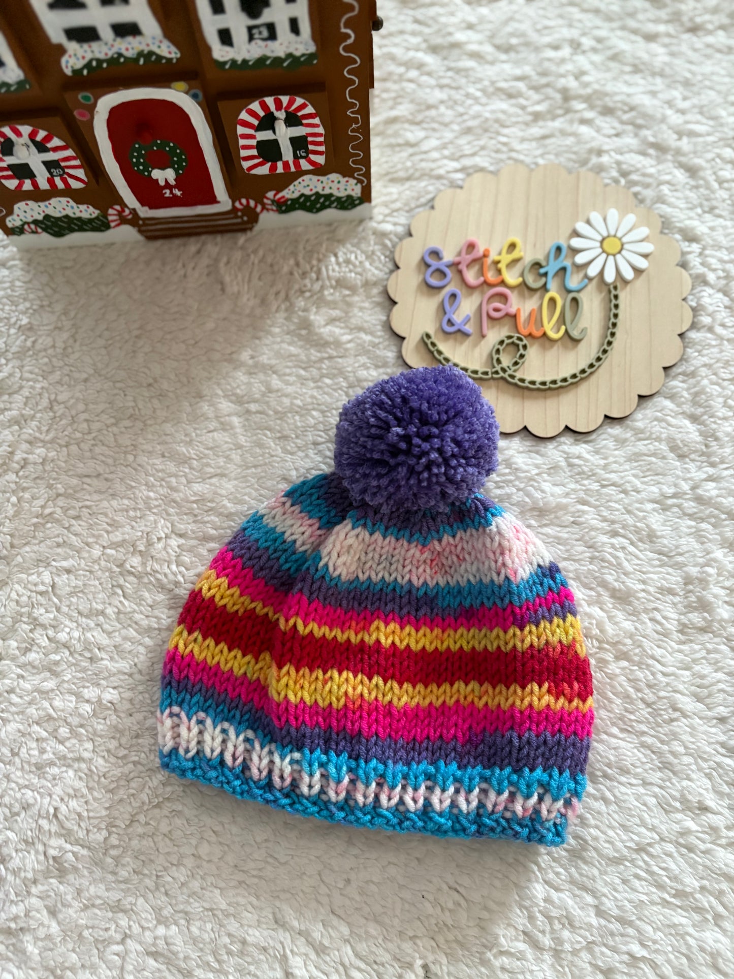 Personalisable knits - 2-3 years bright striped hat with pom pom