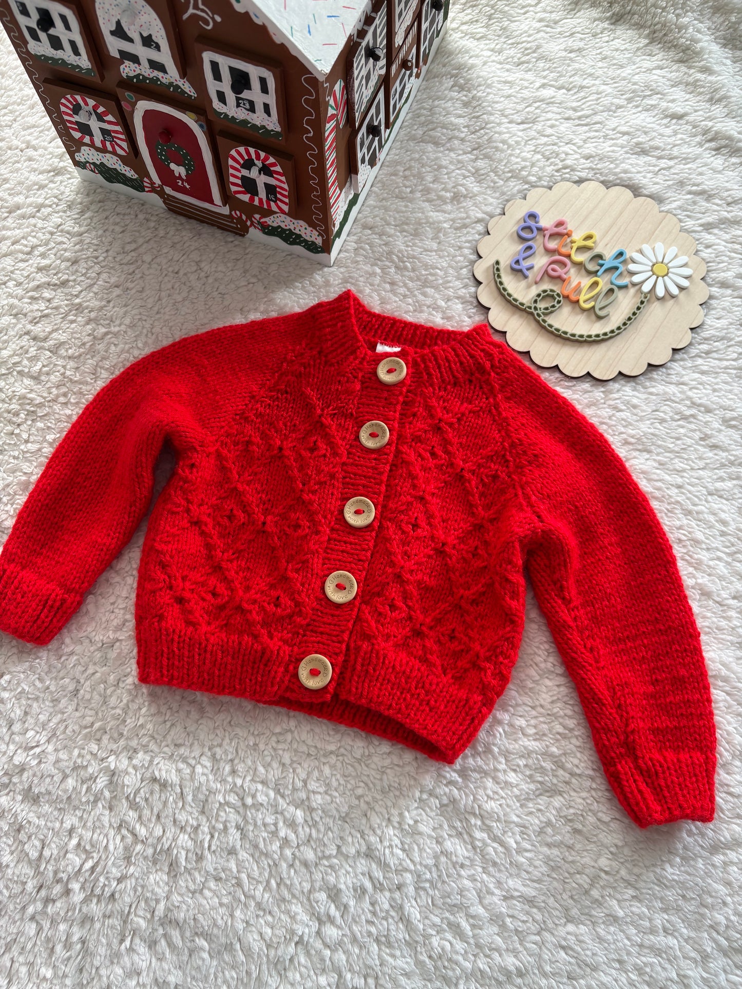 Pre-made Knitted Christmas Red Cardigan with ‘mistletoe & whine’ wording and mistletoe design - Size 3-6 months