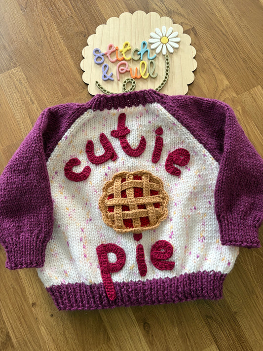 Pre-made Knitted Purple and cream speckle Cutie Pie Cardigan - Size 3-6 months