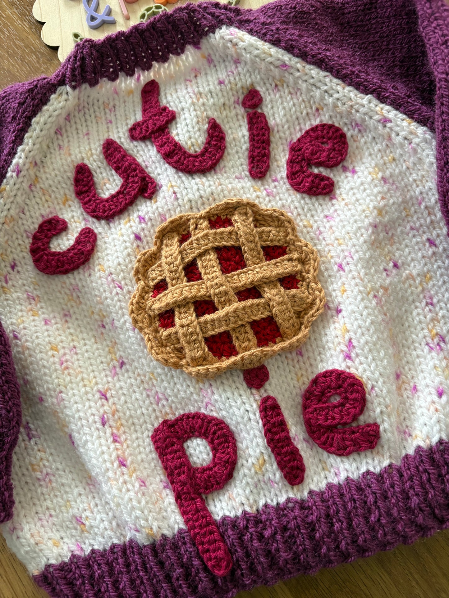 Pre-made Knitted Purple and cream speckle Cutie Pie Cardigan - Size 3-6 months