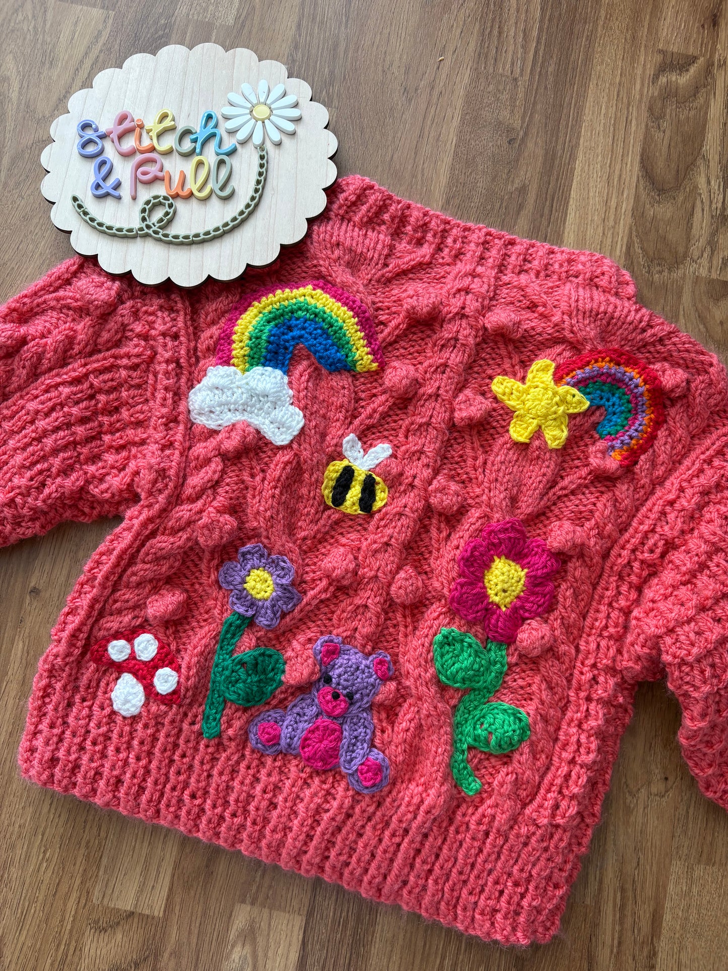 Pre-made Knitted Pink Popcorn Cardigan with flowers, rainbows, star, cloud, bee, mushroom and bear - Size 1-2 years