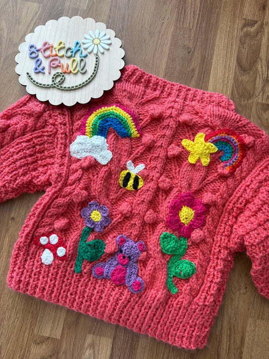 Pre-made Knitted Pink Popcorn Cardigan with flowers, rainbows, star, cloud, bee, mushroom and bear - Size 1-2 years