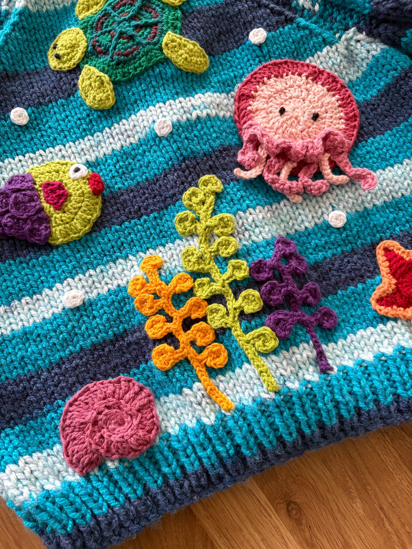 Pre-made Knitted blue stripe Cardigan with sea creatures scene - Size 2-3 years