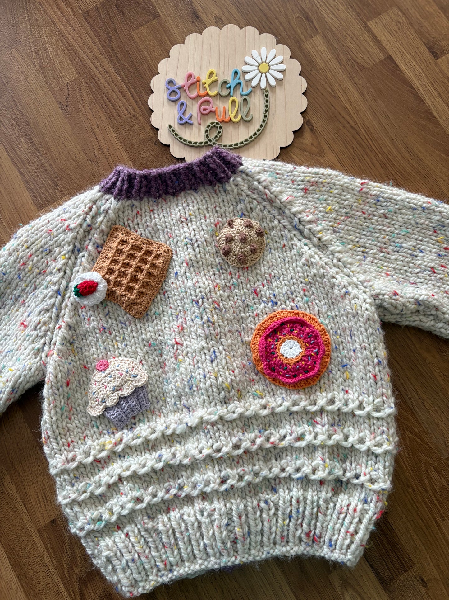 Pre-made Knitted Sprinkle Cream Cardigan with purple ribbing - Size 1-2 years