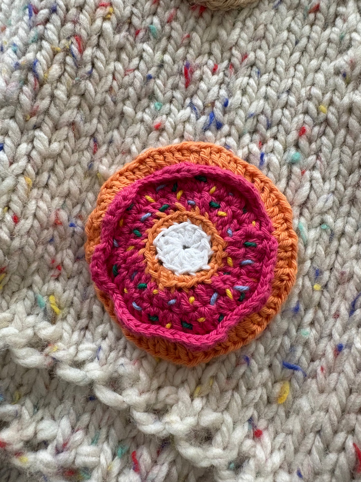 Pre-made Knitted Sprinkle Cream Cardigan with purple ribbing - Size 1-2 years