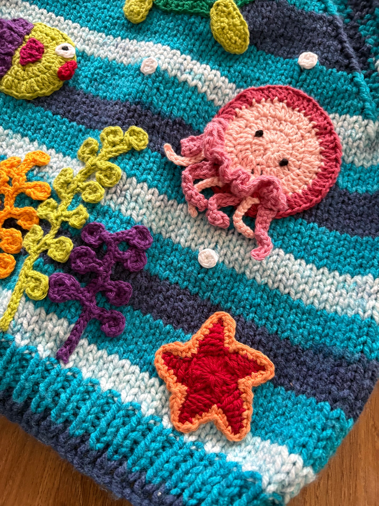 Pre-made Knitted blue stripe Cardigan with sea creatures scene - Size 2-3 years