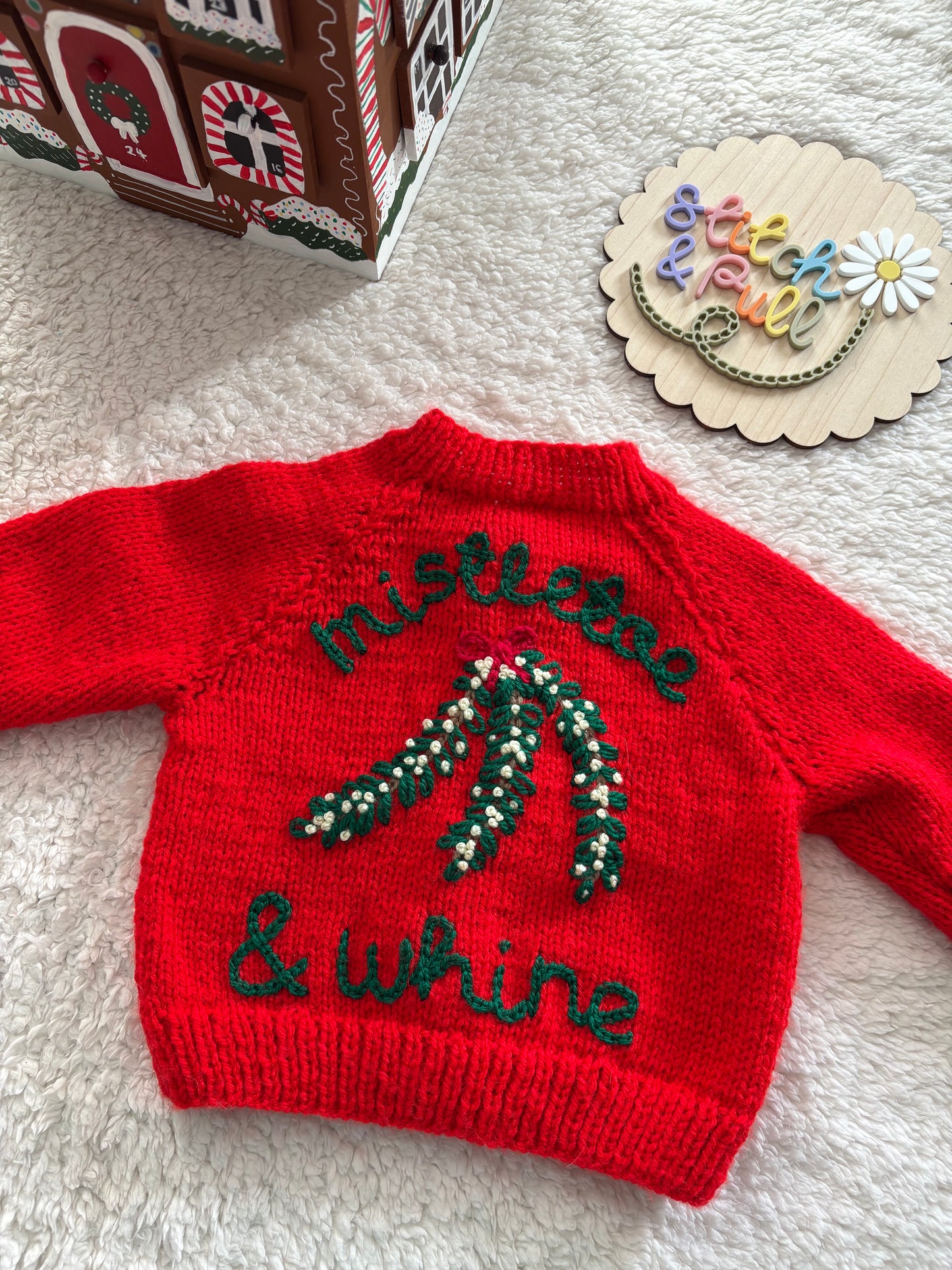 Pre-made Knitted Christmas Red Cardigan with ‘mistletoe & whine’ wording and mistletoe design - Size 3-6 months